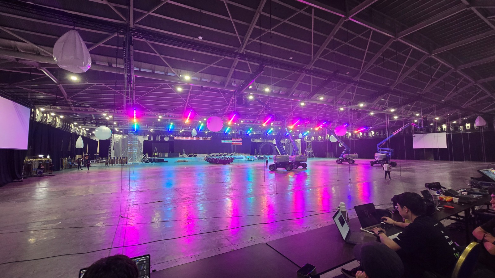AVL Services warehouse build with RGB LED floor and vertical lighting fixtures during rig check