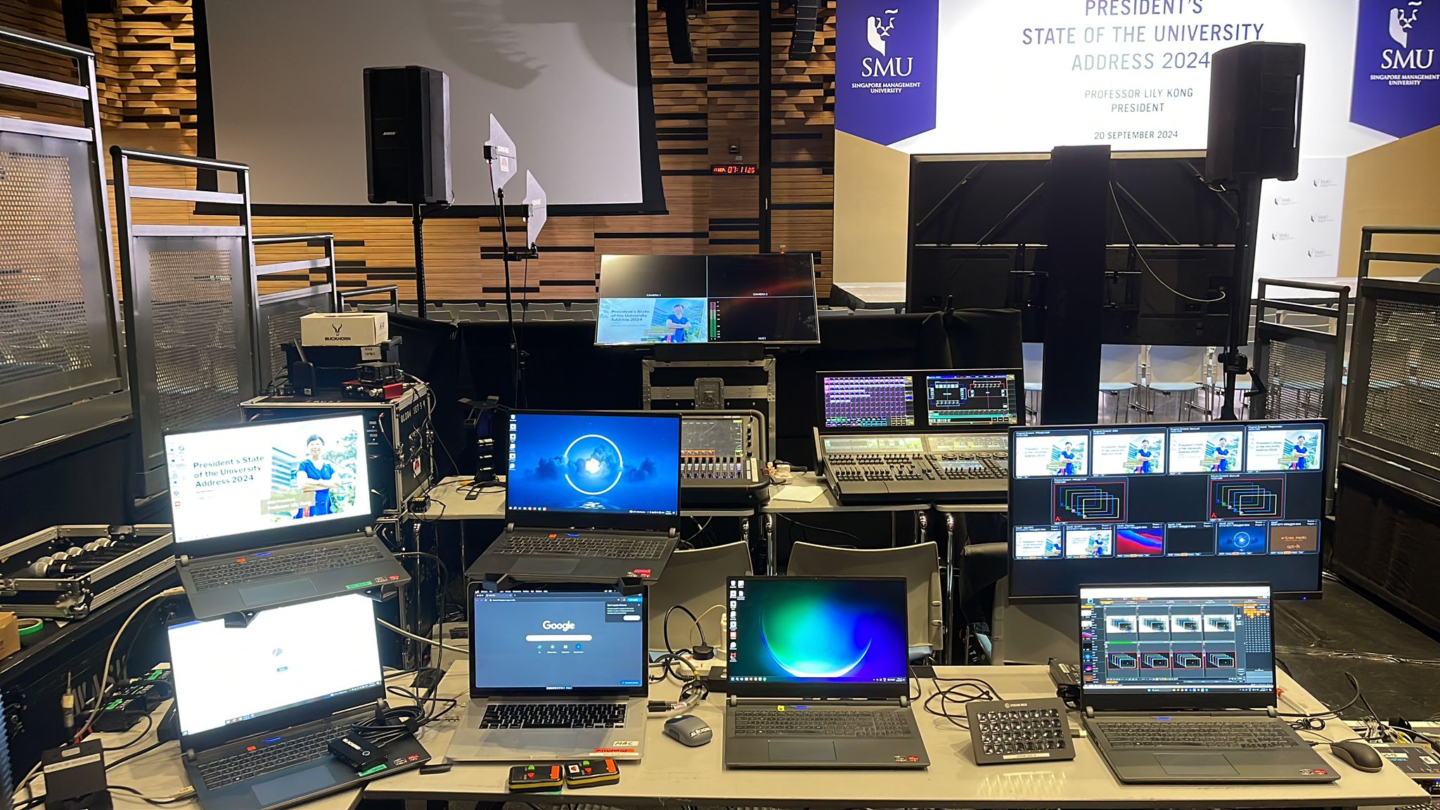 Corporate stage with live production lighting at SMU