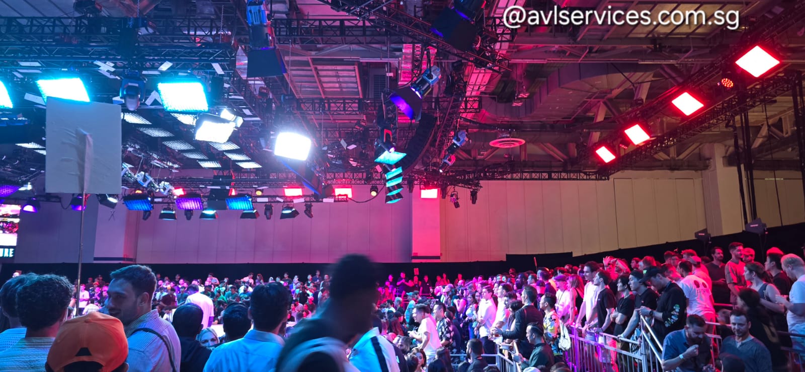 AVL Services live event production with professional stage lighting and audio setup