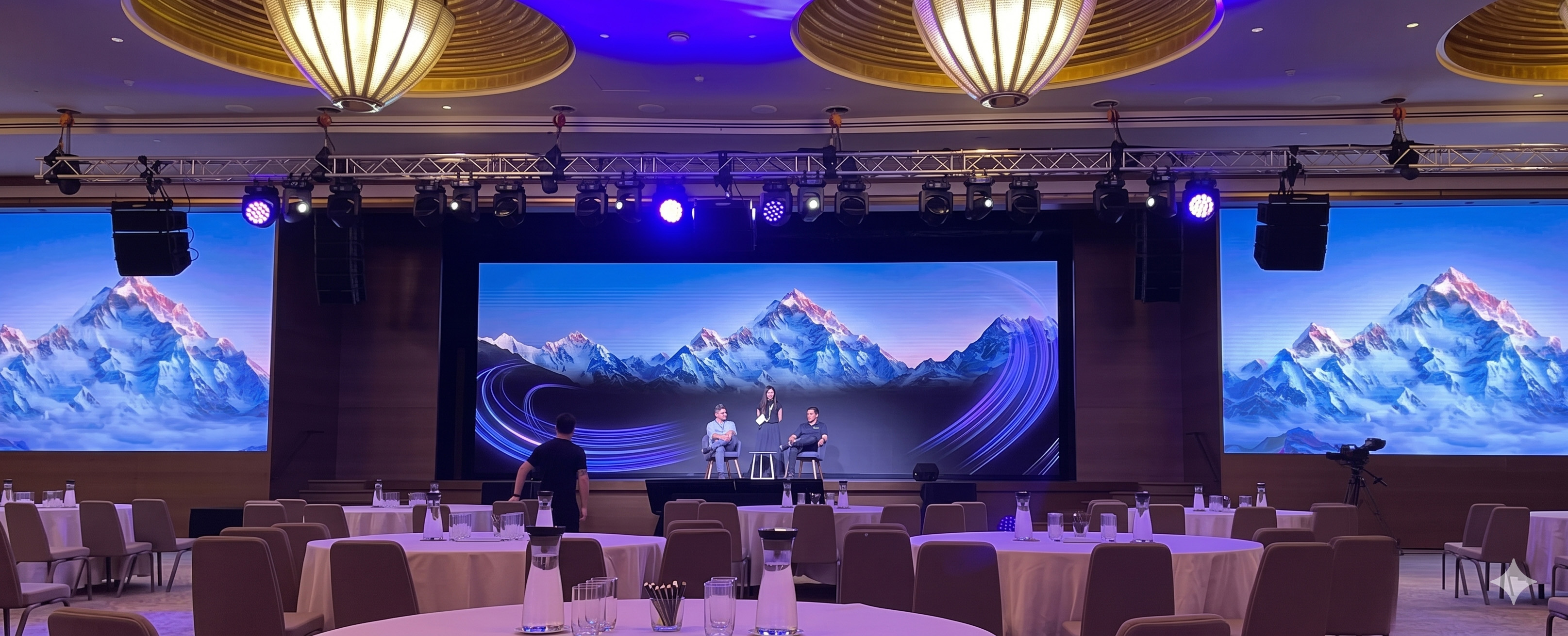Live concert stage with full lighting rig and PA system